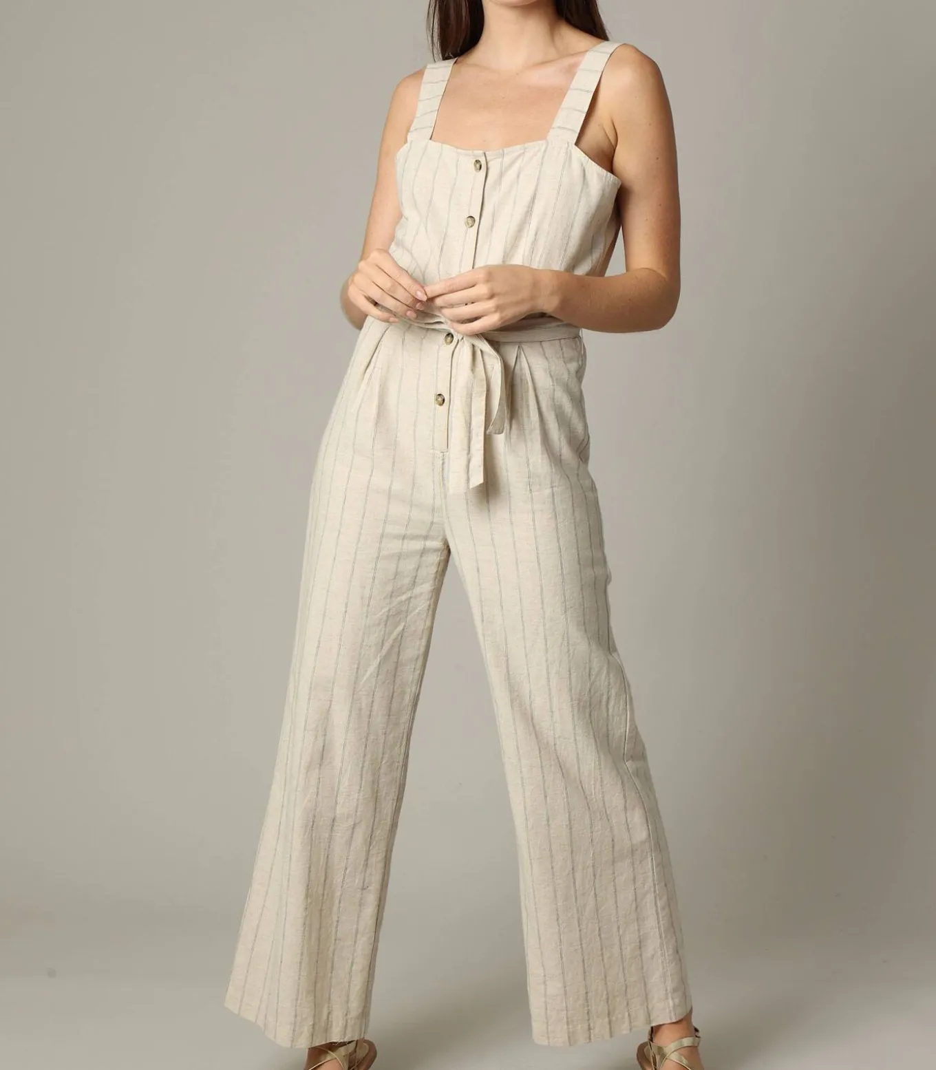 AYLA - Gestreepte linnen damesjumpsuit met knoopsluiting aan de voorkant