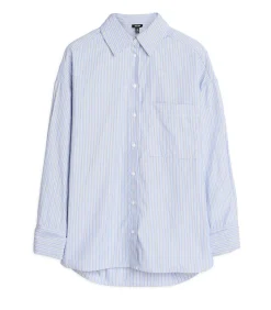 Blauw-wit gevoerde damesblouse