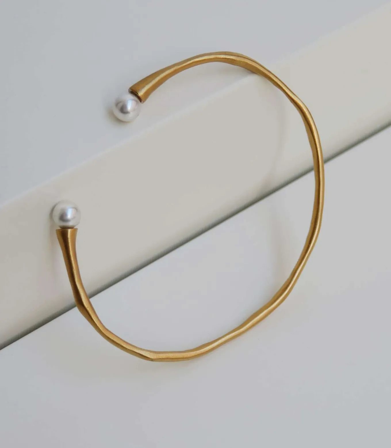 Gouden armband Eclat met witte parel