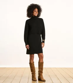 Korte zwarte jurk van gebreide stof met lange mouwen