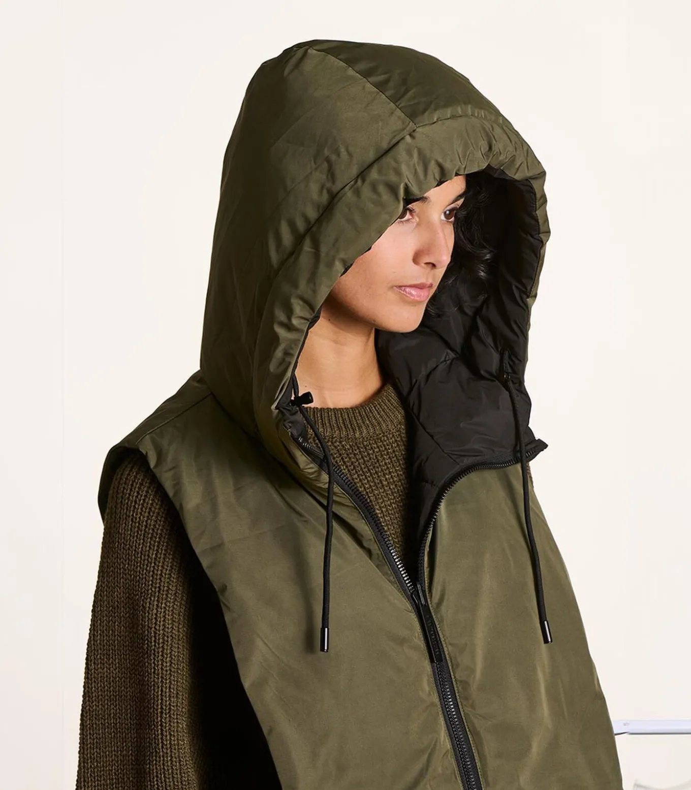 Omkeerbare capuchon zwart en kaki