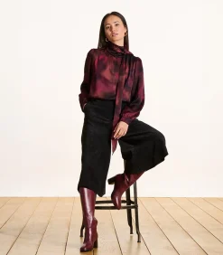 Rood topje met lange mouwen en print