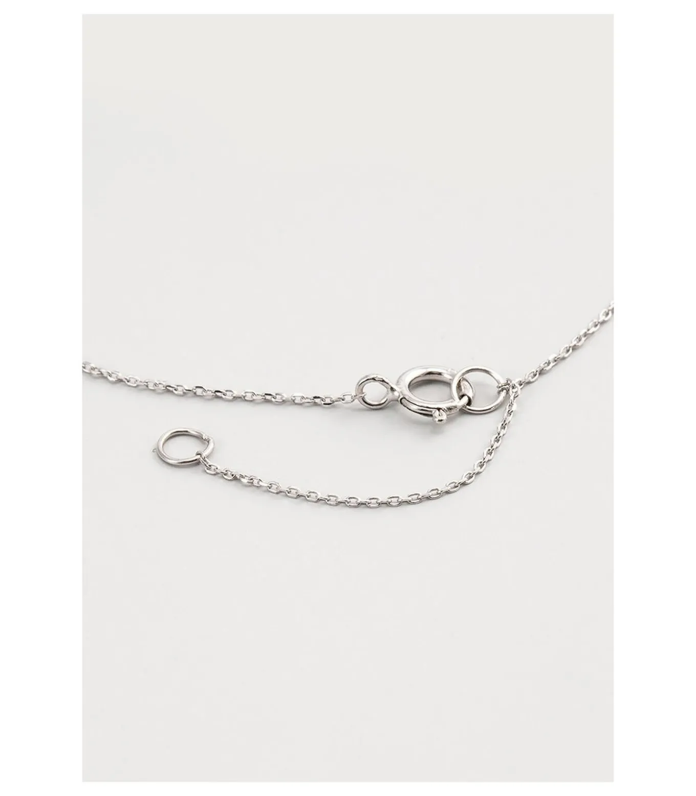 Witgouden armband met diamanten en topaas